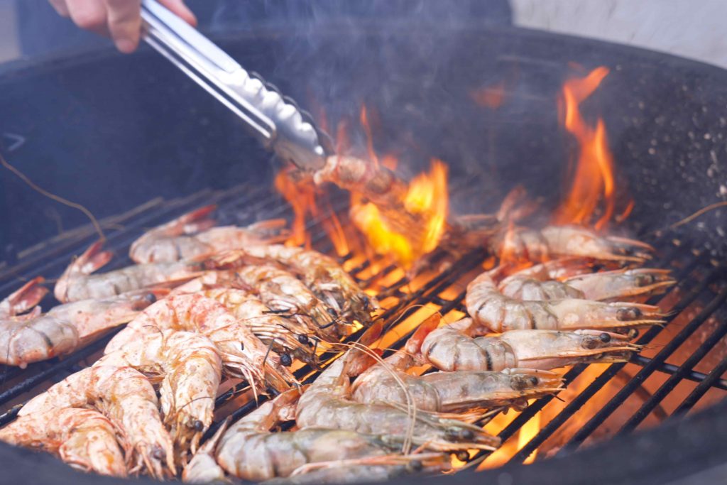 Tiger Prawns with black garlic mayo on the grill